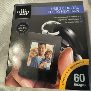 Digital Photo Keychainin by the Sharper Image. NEW in box! Great gift!